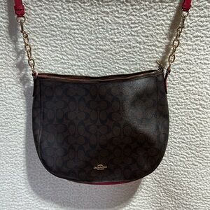 Gently used large coach purse w long strap